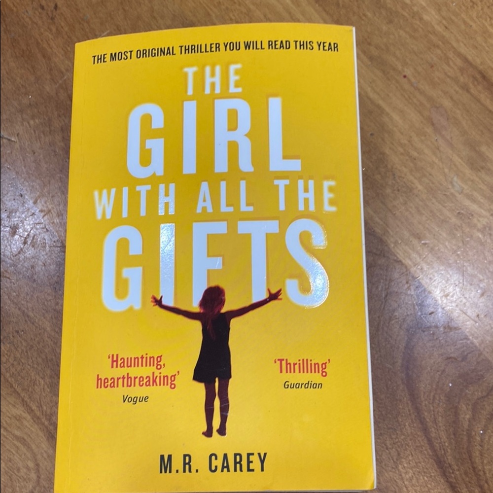 “The Girl With All The Gifts”, by M.R. Carry, paperback book.